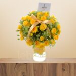 Sunshine Glow – Yellow Roses & Baby Roses in Round Glass Vase – Wholesale in Qatar - 1254