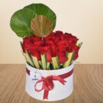 Elegant Rose & Palm Leaf Arrangement in Round Box – Wholesale in Qatar - 1448